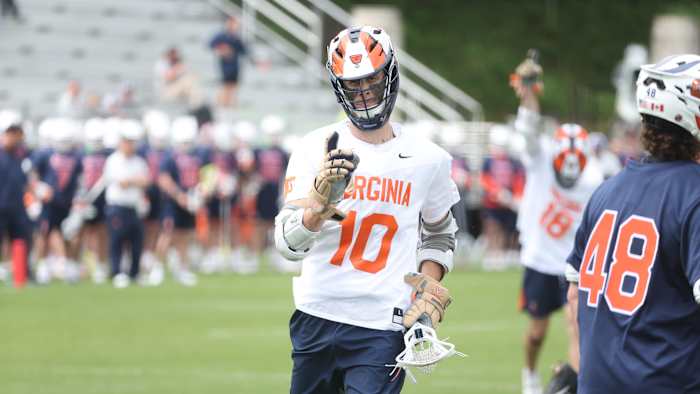 Xander Dickson celebrates after scoring a goal during the Virginia men's lacrosse game against Syracuse at Klockner Stadium.